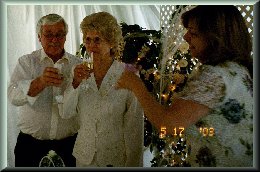 Barbara toasting the new couple
